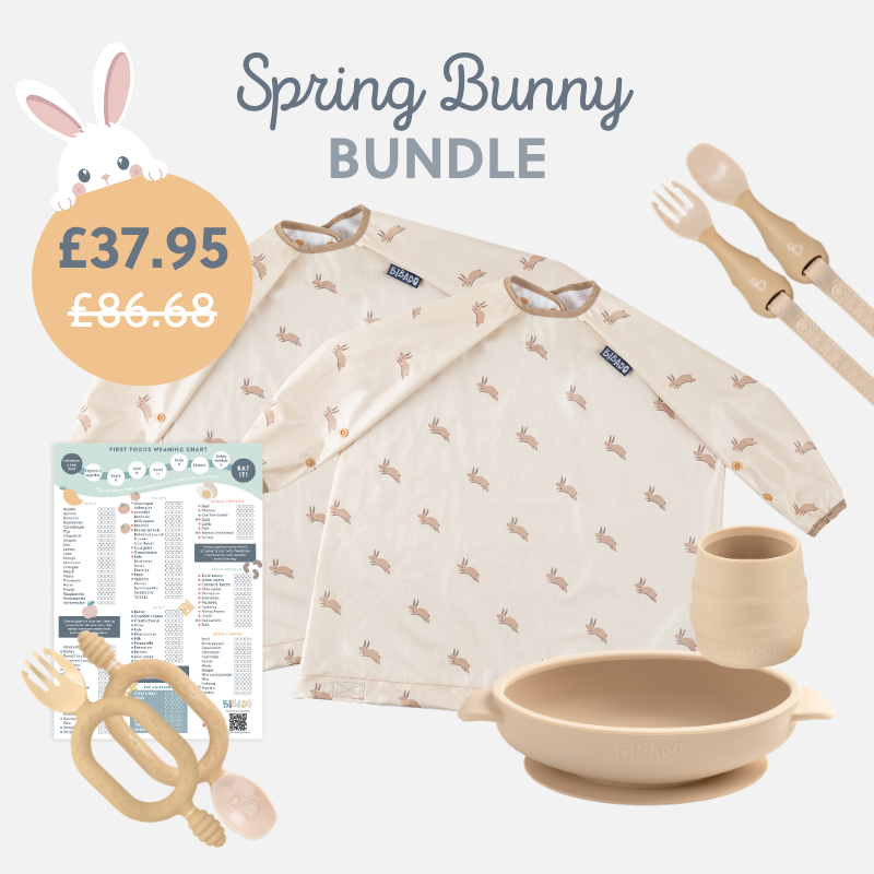 Spring Bunny Bundle: Two long-sleeved bibs with bunny print, beige silicone bowl, cup, and two sets of utensils. - Product image