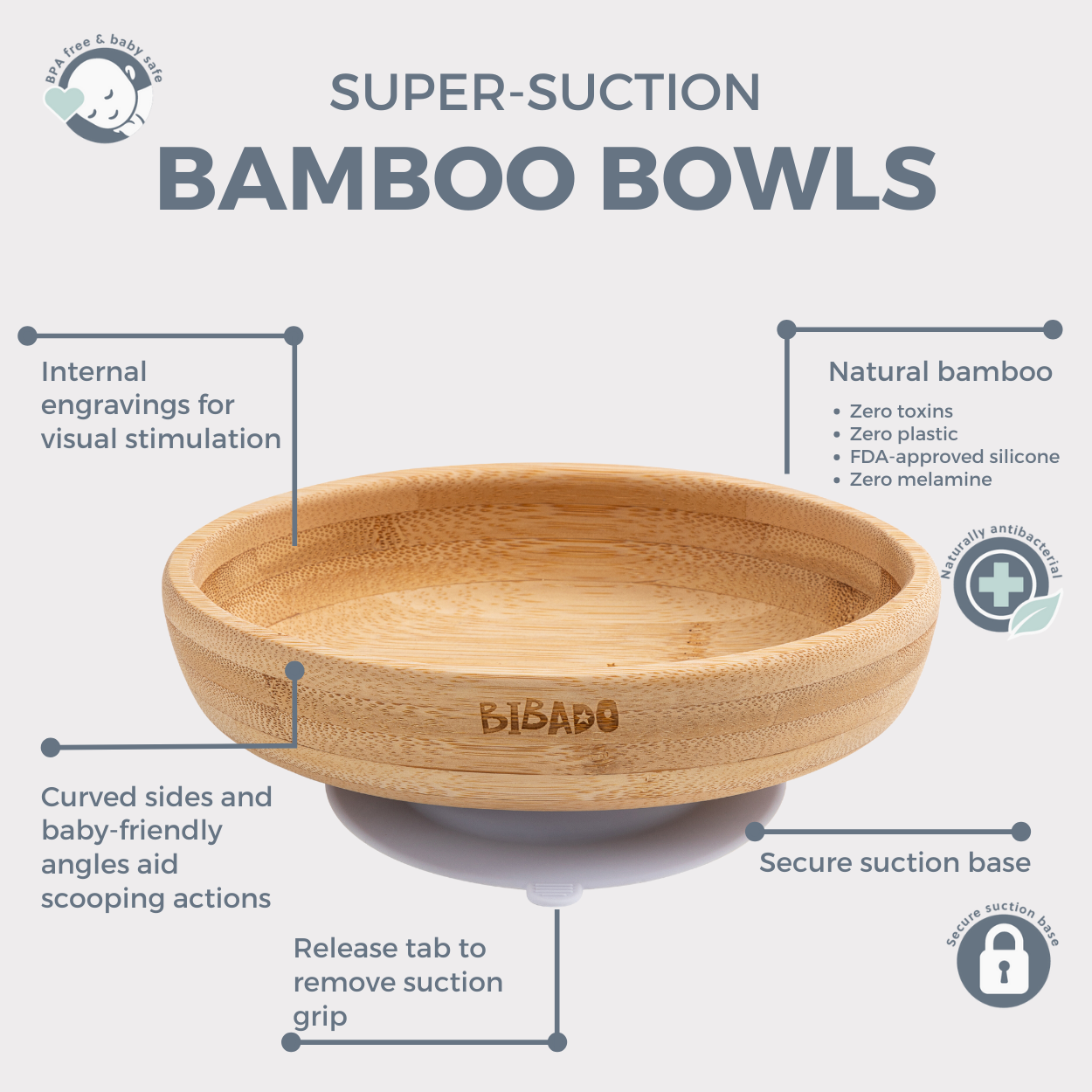 Natural bamboo suction bowl with curved sides, internal engravings, and a white silicone base. - Product image