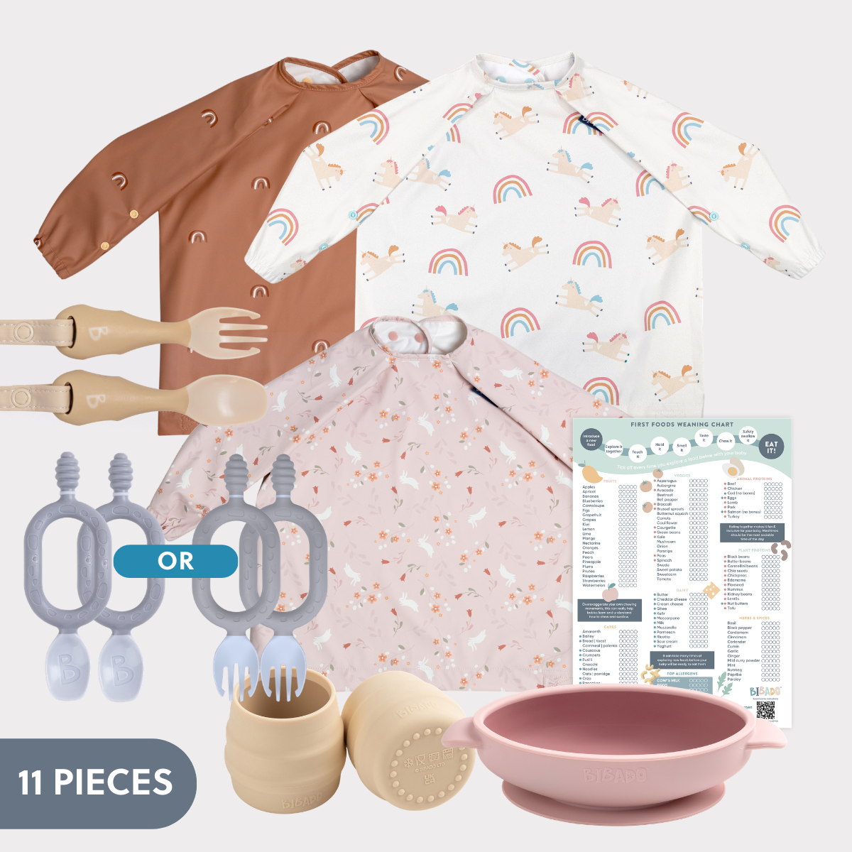 Mama Bear weaning bundle: brown and rainbow unicorn bibs, beige cutlery, gray Dippit/Sporkit, pink silicone bowl and cups, weaning chart. - Product image