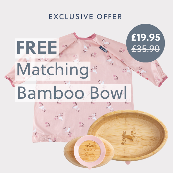 Pink long-sleeved coverall with unicorn print and a matching bamboo bowl with a bunny engraving. - Product image