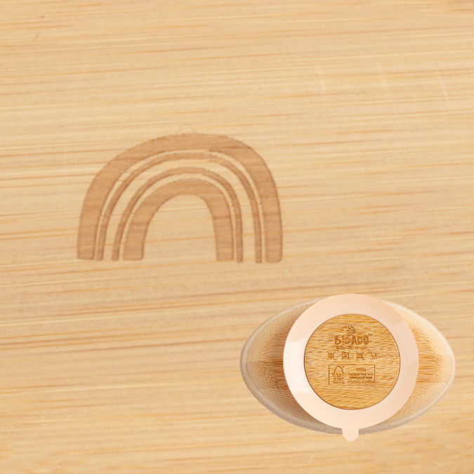 Bibado natural bamboo suction bowl with a rainbow engraving and peach silicone base. - Product image
