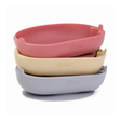 Three silicone baby feeding bowls stacked on a white background, featuring a dusty pink top bowl, a light beige middle bowl, and a light gray bottom bowl with suction cups.