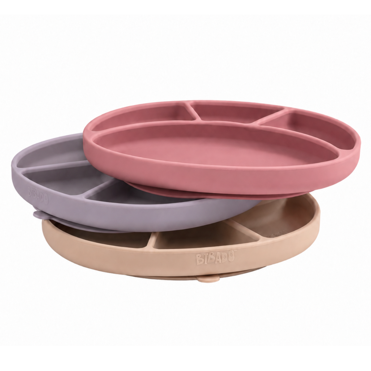 Three silicone plates in mist, blush, and fawn on a white background - Product image