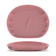 A dark pink silicone baby weaning plate shown in two views: a top-down view displaying the scalloped rim and middle divider, and a side profile view showing the base with the embossed brand name 'BIBADO'.