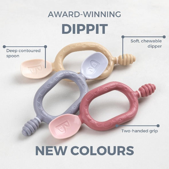 Three Dippit baby spoons in beige, grey, and pink, showing the deep contoured spoon, soft chewable dipper, and two-handed grip. - Product image