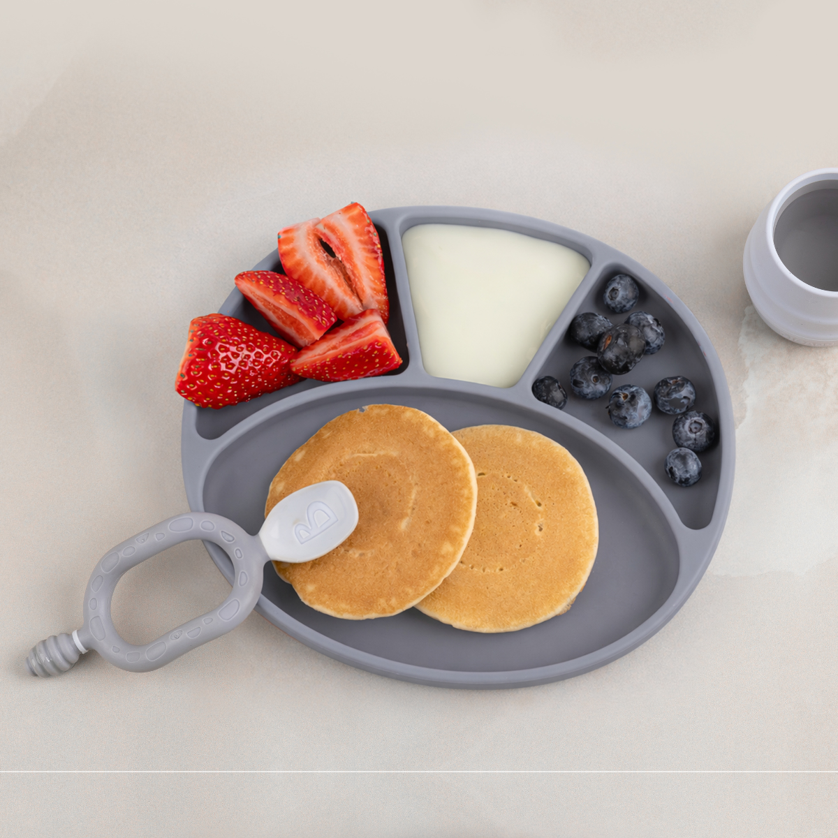 Mist silicone divider plate with pancakes, strawberries, and blueberries on a light background - Product image